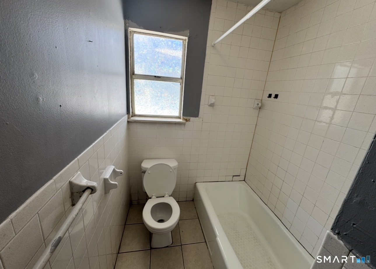 44 Abcd Angel Drive Waterbury, CT 06708 - Photo 13 of 20 a bathroom with a toilet and a shower