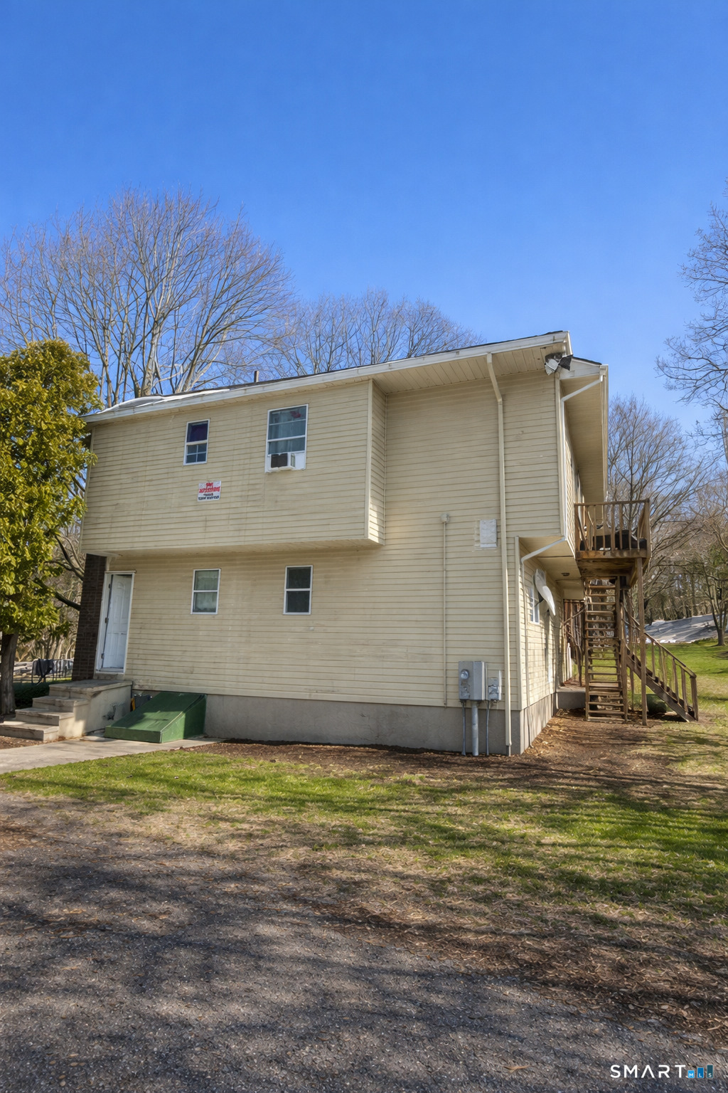44 Abcd Angel Drive Waterbury, CT 06708 - Photo 19 of 20 a view of a house with a yard