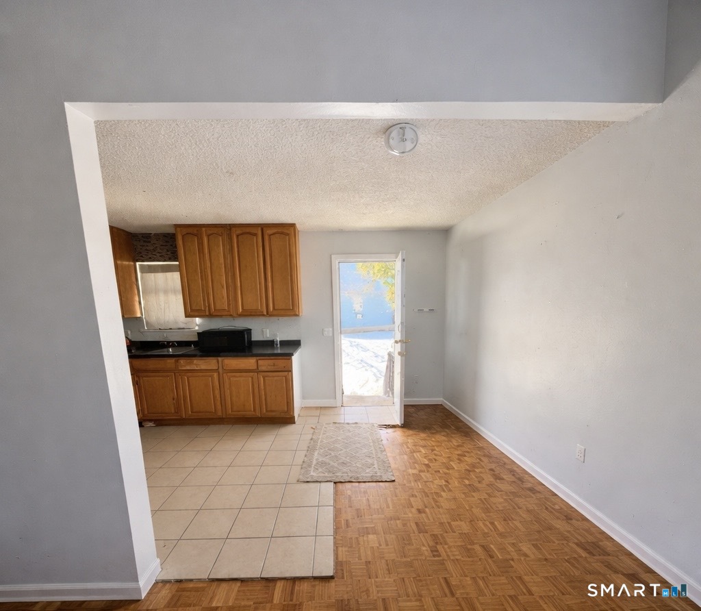 44 Abcd Angel Drive Waterbury, CT 06708 - Photo 5 of 20 a living room with a couch