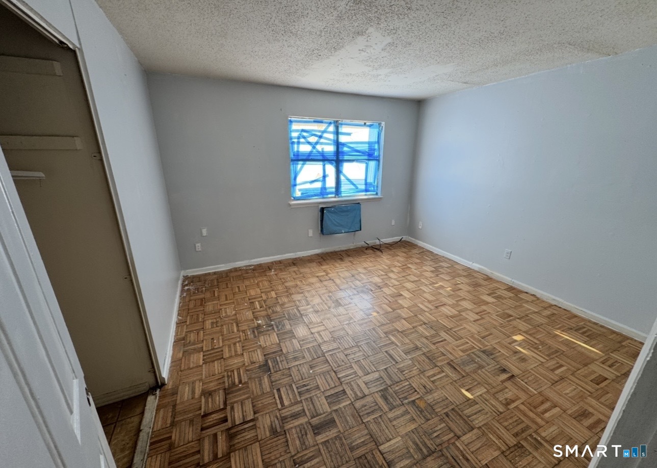 44 Abcd Angel Drive Waterbury, CT 06708 - Photo 10 of 20 an empty room with windows