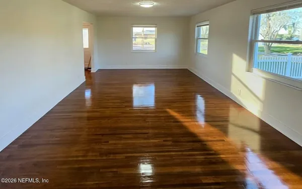 a view of an empty room and window