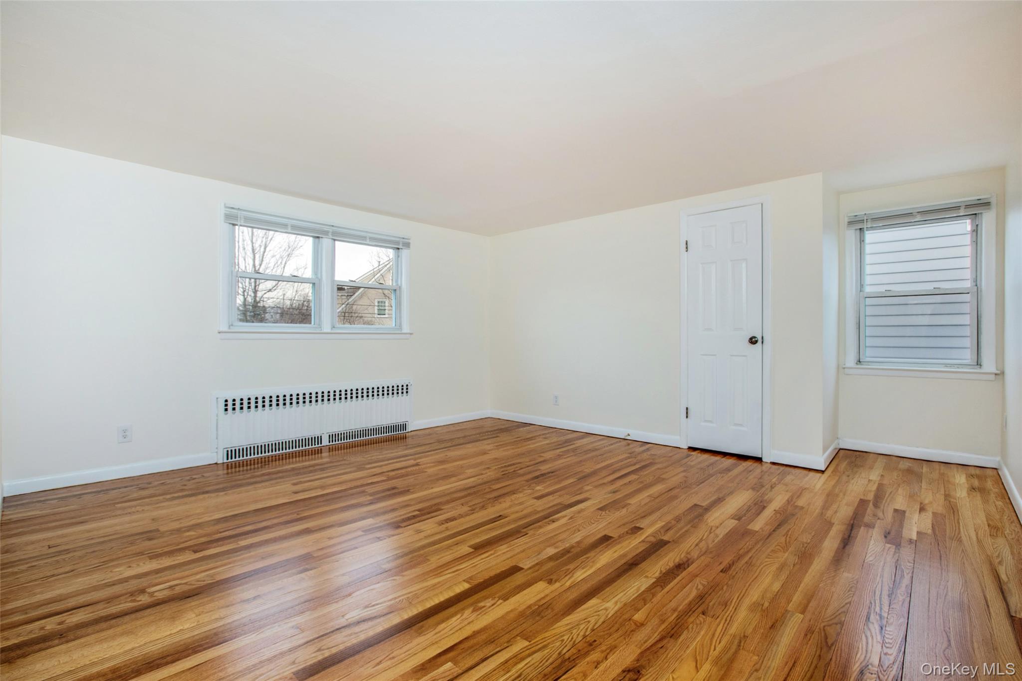 40 Division Street Rye Brook, NY 10573 - Photo 6 of 20 Beauty hardwood floors, window blinds already included. **There is now a wall Air conditioning unit located beneath the single window in this photo. It is not shown in this photo as photo was taken before it was installed.