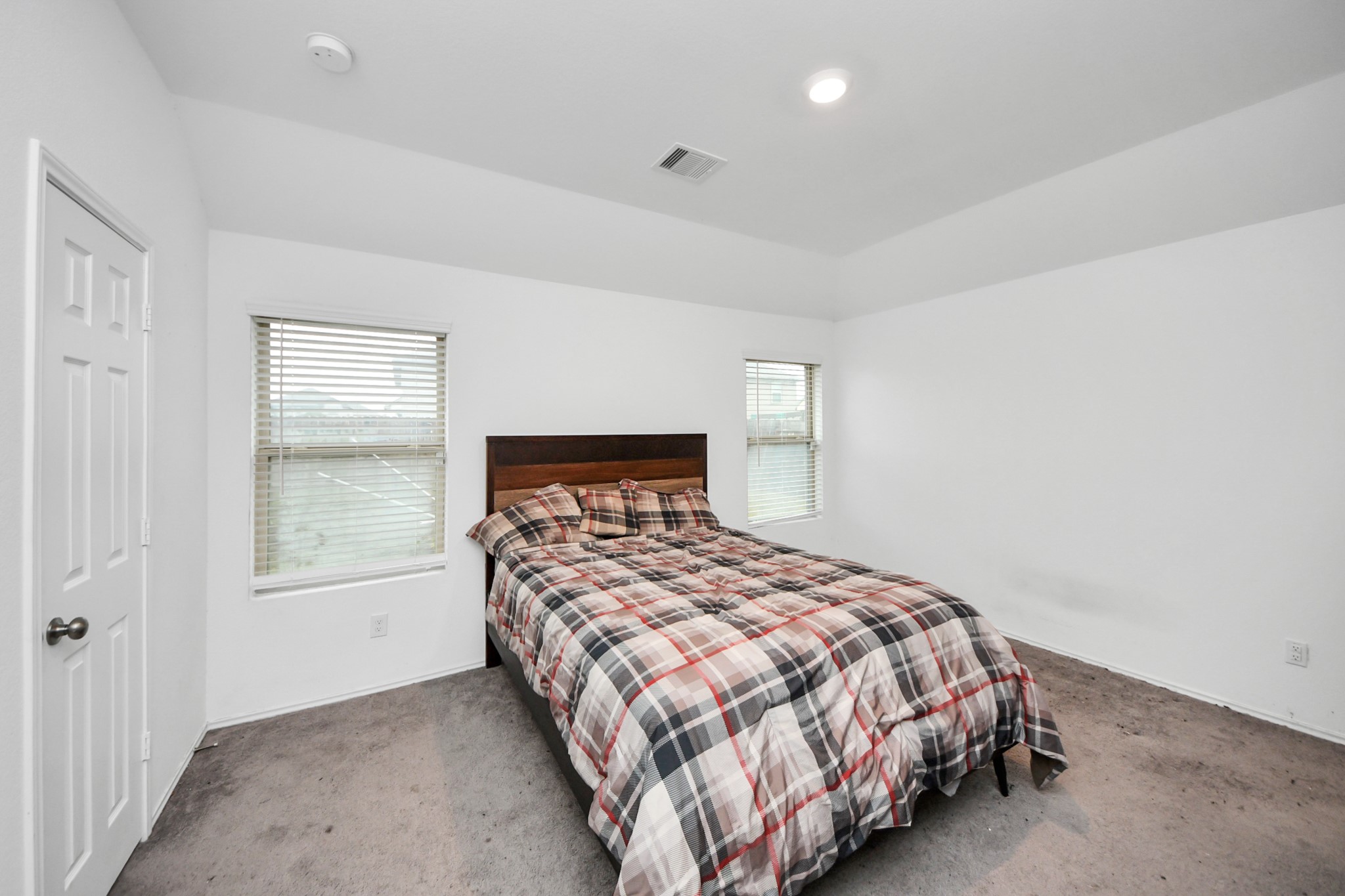 14606 Whitstone Gully Way Rosharon, TX 77583 - Photo 24 of 30 a bedroom with a bed and a window