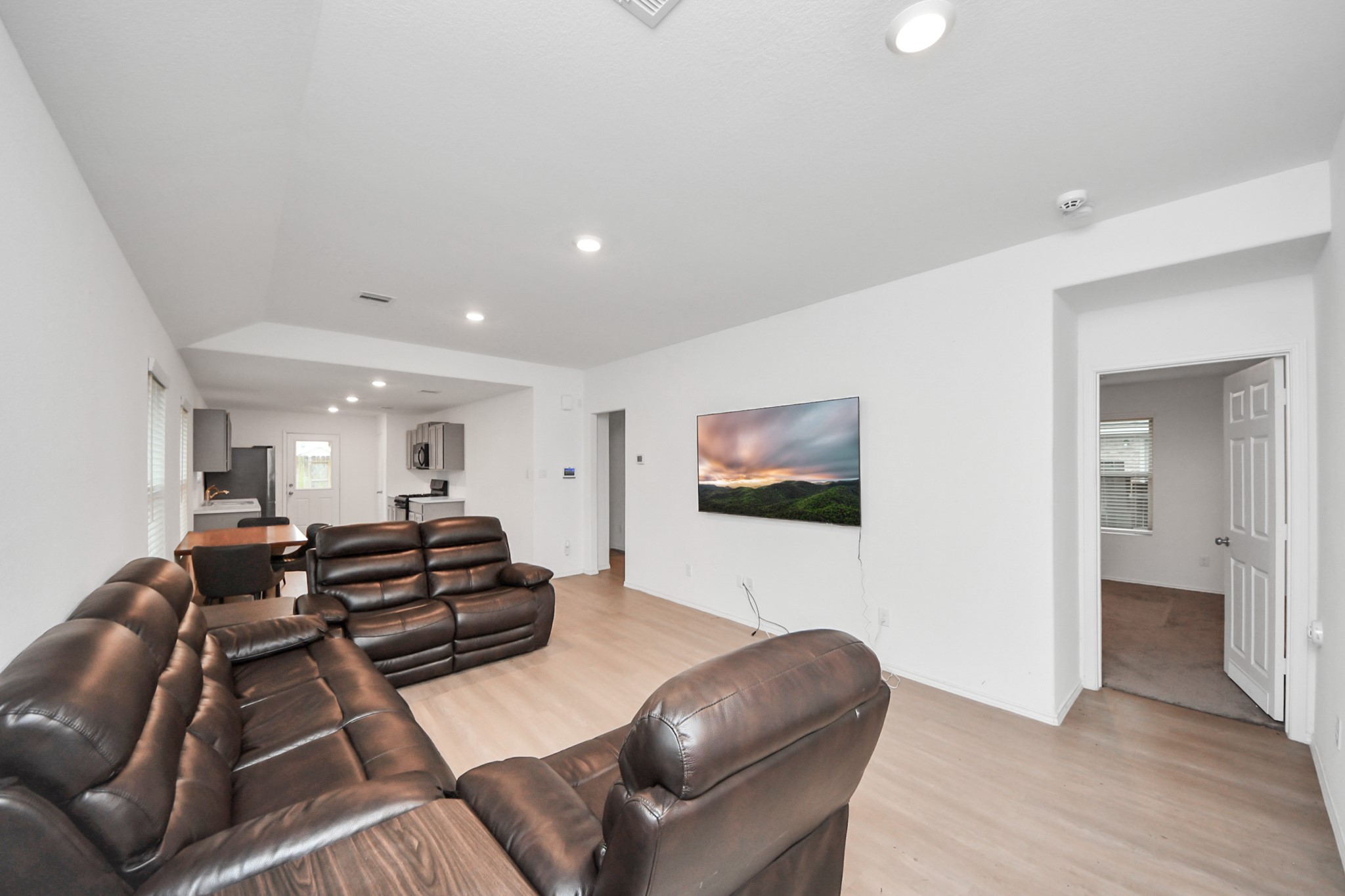 14606 Whitstone Gully Way Rosharon, TX 77583 - Photo 9 of 30 a living room with furniture and a flat screen tv