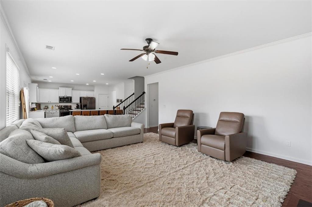 1675 Cedar Mill Drive Powder Springs, GA 30127 - Photo 12 of 45 a living room with furniture