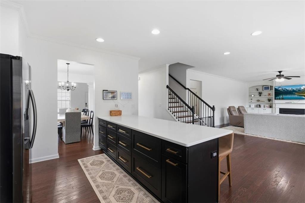 1675 Cedar Mill Drive Powder Springs, GA 30127 - Photo 6 of 45 a kitchen with a refrigerator and a sink
