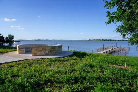 a view of a outdoor space with a lake view