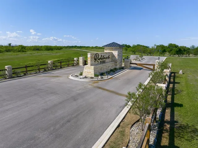 a view of a city with a lake