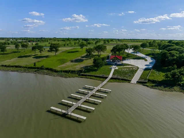 a view of a golf course with a lake