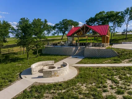 a view of a lake with a yard