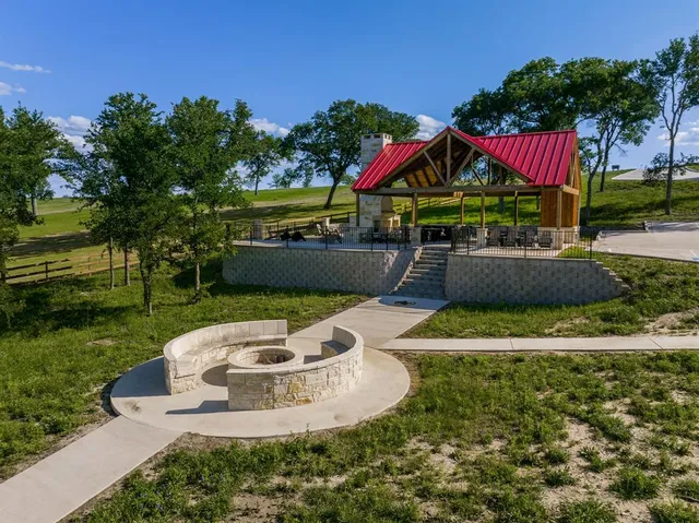 a view of a lake with a yard