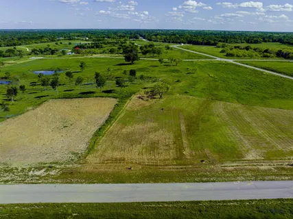 a view of a garden with an outdoor space