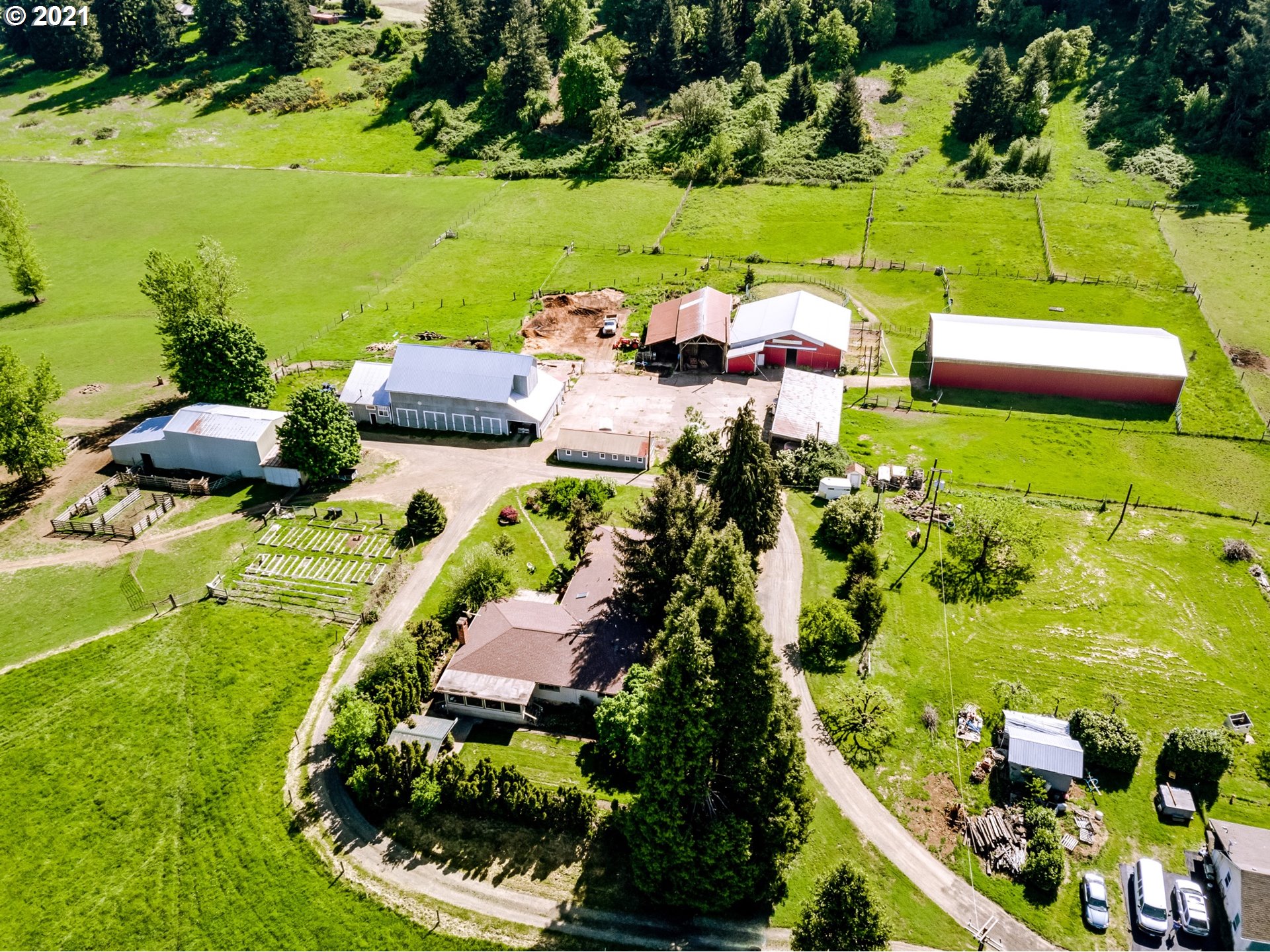 79385 Sears Road Cottage Grove, OR 97424 - Photo 1 of 32 an aerial view of swimming pool patio swimming pool and outdoor seating