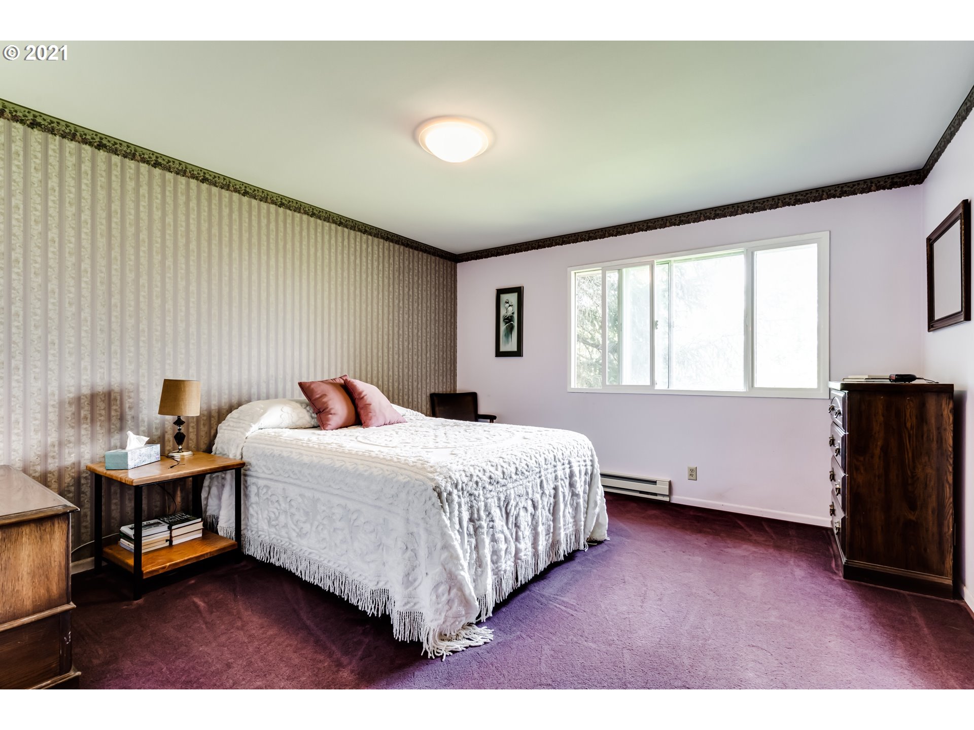 79385 Sears Road Cottage Grove, OR 97424 - Photo 14 of 32 a bedroom with a bed and a window