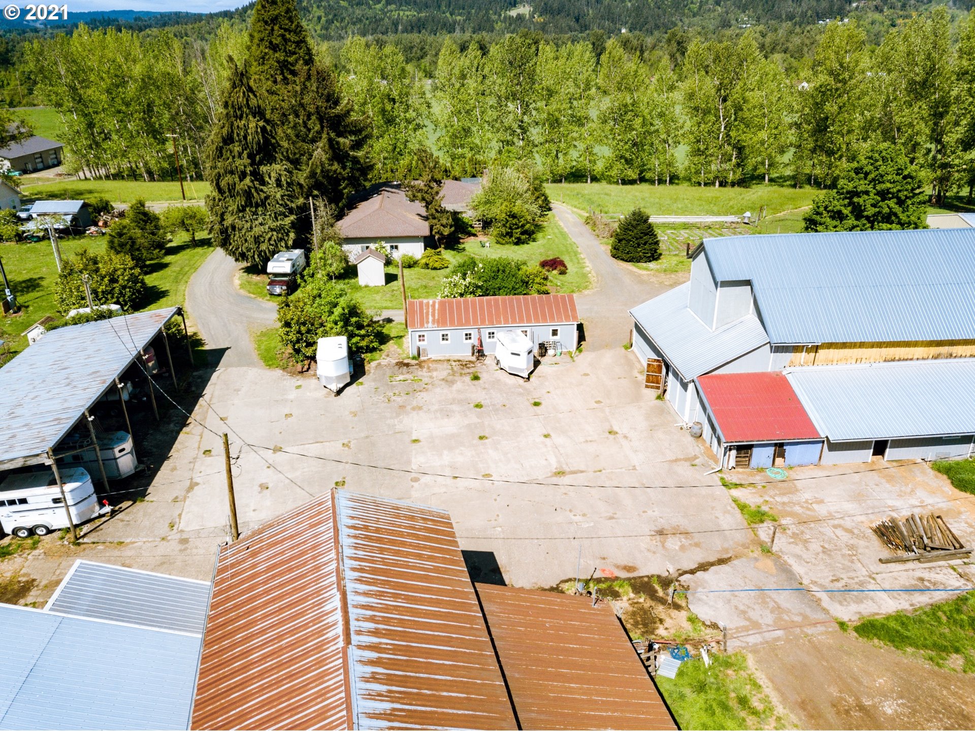 79385 Sears Road Cottage Grove, OR 97424 - Photo 31 of 32 an aerial view of a house with a yard