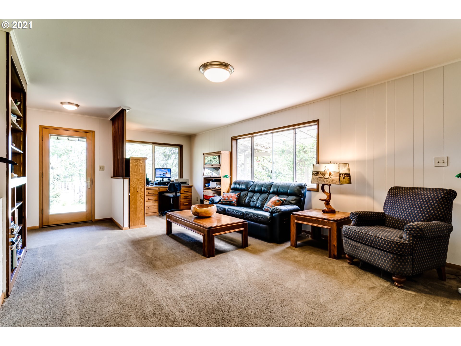79385 Sears Road Cottage Grove, OR 97424 - Photo 7 of 32 a living room with furniture and large windows