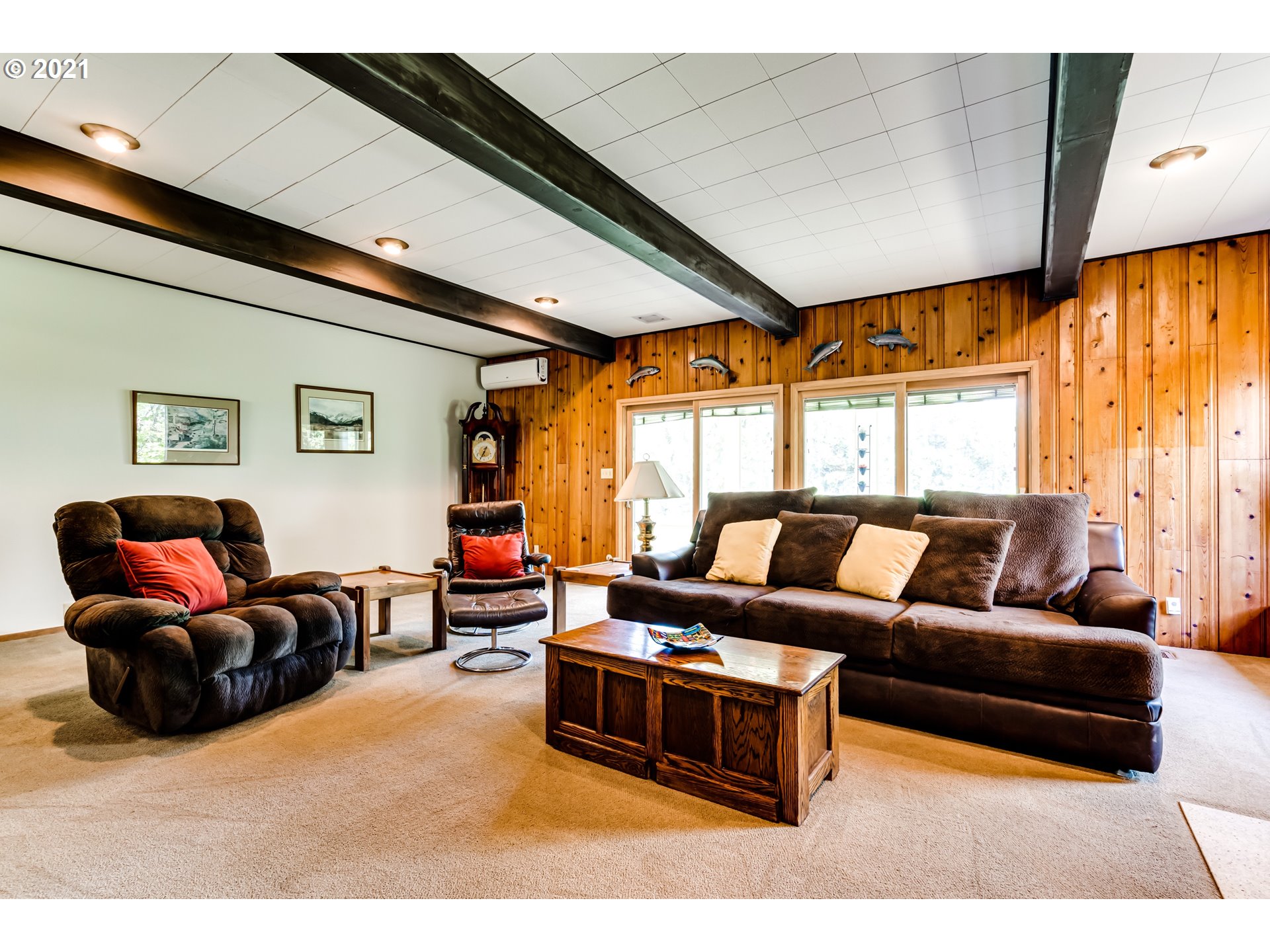 79385 Sears Road Cottage Grove, OR 97424 - Photo 8 of 32 a living room with furniture a couch and two large window