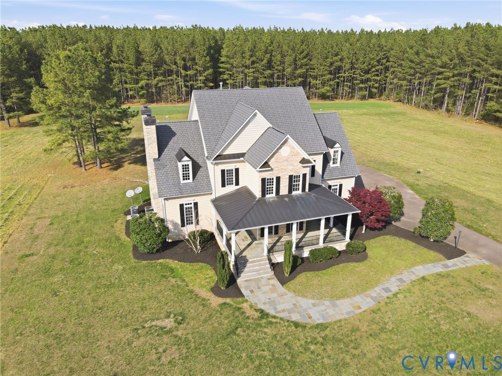 2880 Millmount Parkway Powhatan, VA 23139 - Photo 2 of 36 an aerial view of a house with a garden and lake view
