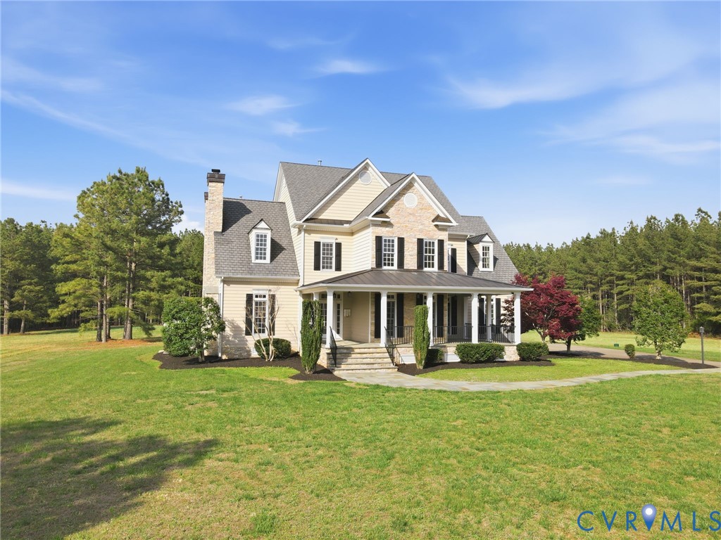 2880 Millmount Parkway Powhatan, VA 23139 - Photo 28 of 36 a front view of a house with a garden