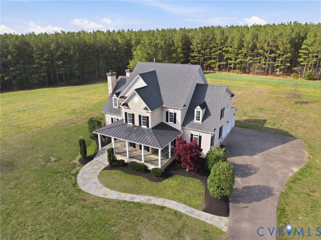 2880 Millmount Parkway Powhatan, VA 23139 - Photo 30 of 36 an aerial view of a house with a garden and lake view