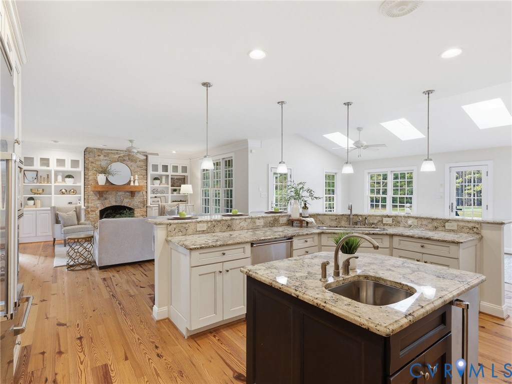 2880 Millmount Parkway Powhatan, VA 23139 - Photo 4 of 36 a kitchen with kitchen island granite countertop lots of counter top space