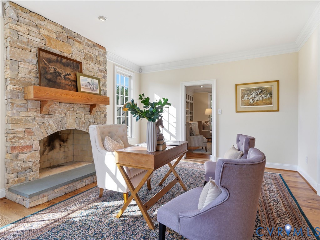 2880 Millmount Parkway Powhatan, VA 23139 - Photo 6 of 36 a living room with furniture and a fireplace