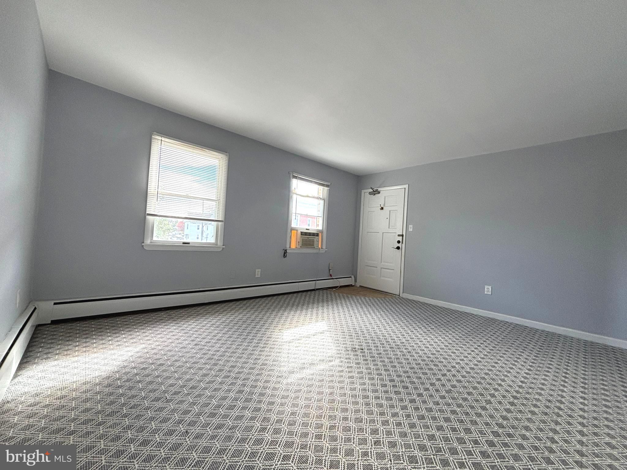 43 South Main Street Woodstown, NJ 08098 - Photo 7 of 13 an empty room with windows