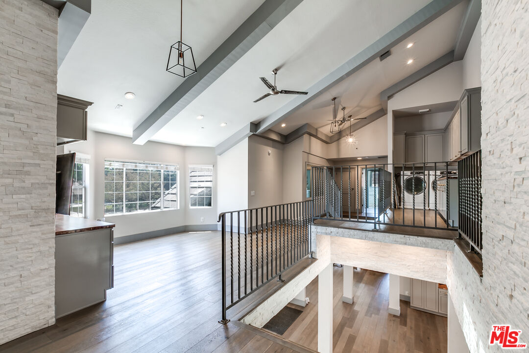 17153 Rayen Street Northridge, CA 91325 - Photo 42 of 47 a view of entryway with wooden floor