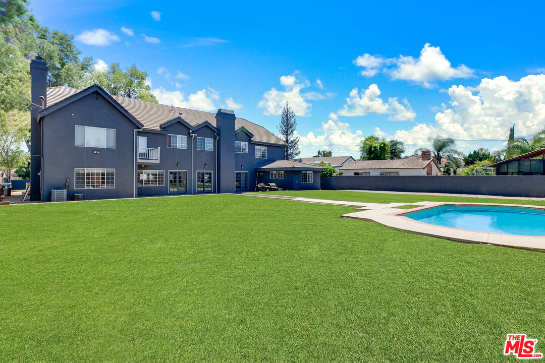 17153 Rayen Street Northridge, CA 91325 - Photo 45 of 47 a view of a house with a big yard