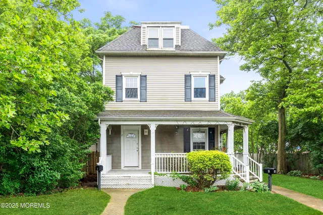 front view of a house and a yard