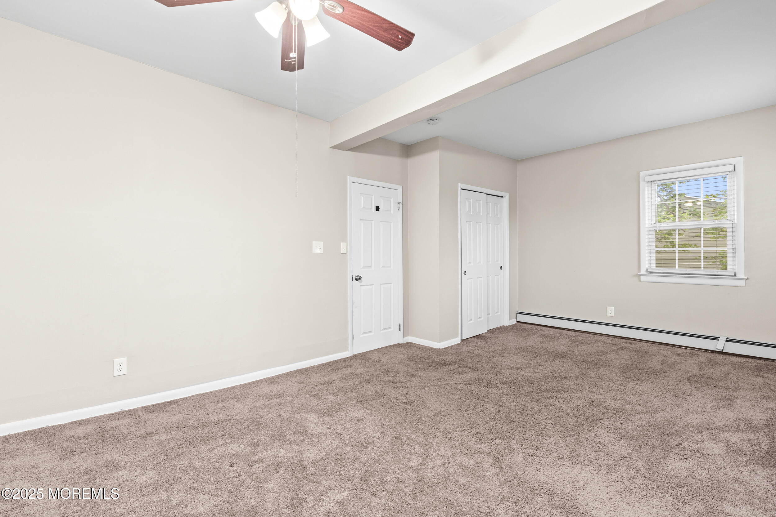 8 West End Court Long Branch, NJ 07740 - Photo 22 of 45 a view of an empty room with a window