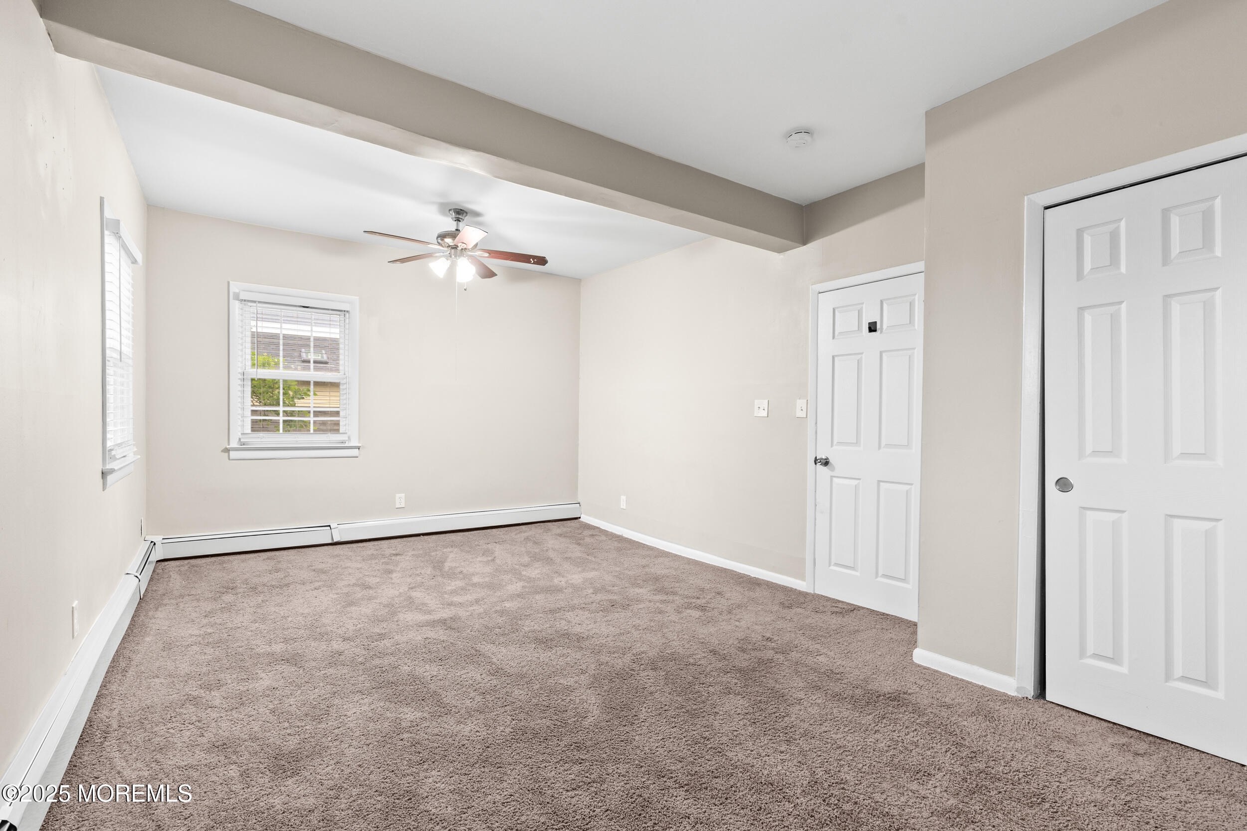 8 West End Court Long Branch, NJ 07740 - Photo 23 of 45 a view of an empty room with a window