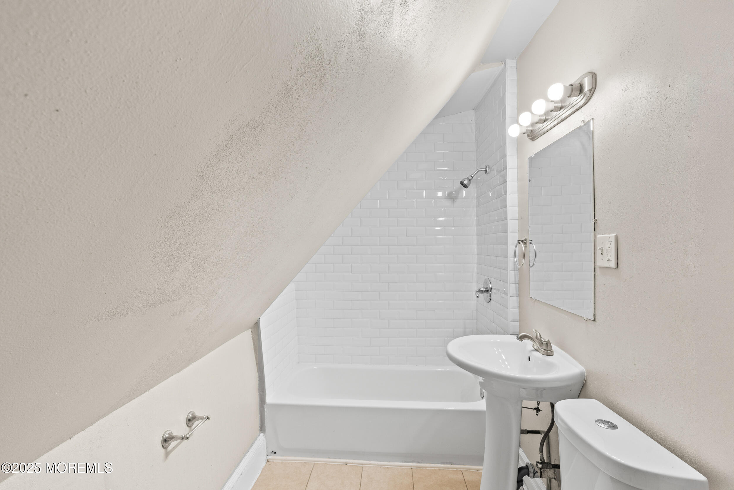 8 West End Court Long Branch, NJ 07740 - Photo 29 of 45 a bathroom with a sink a toilet and shower