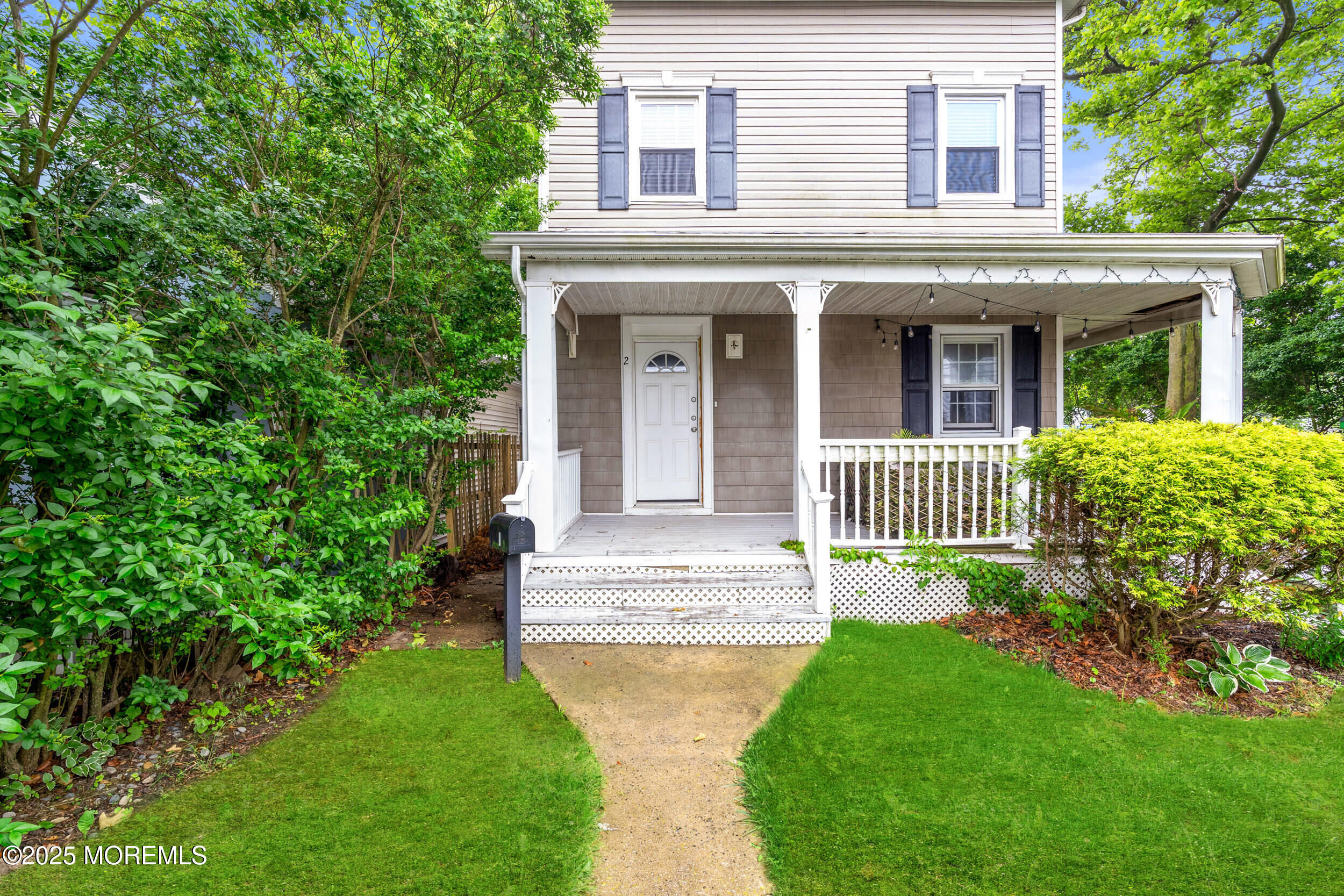 8 West End Court Long Branch, NJ 07740 - Photo 45 of 45 front view of a house with a yard