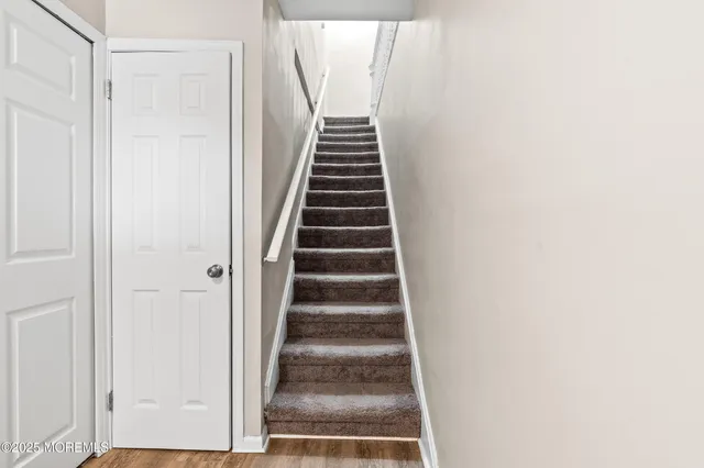 a view of entryway with kitchen