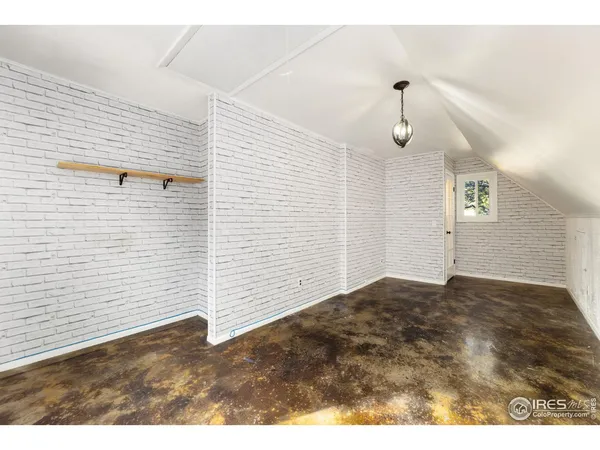 a view of empty room with windows