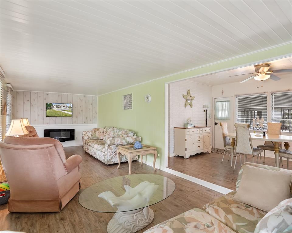Park City Davie, FL 33324 - Photo 22 of 26 a living room with furniture and a table