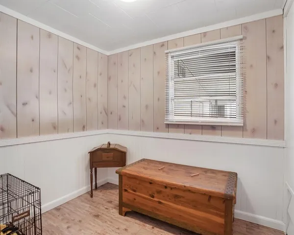 a room with furniture and a window