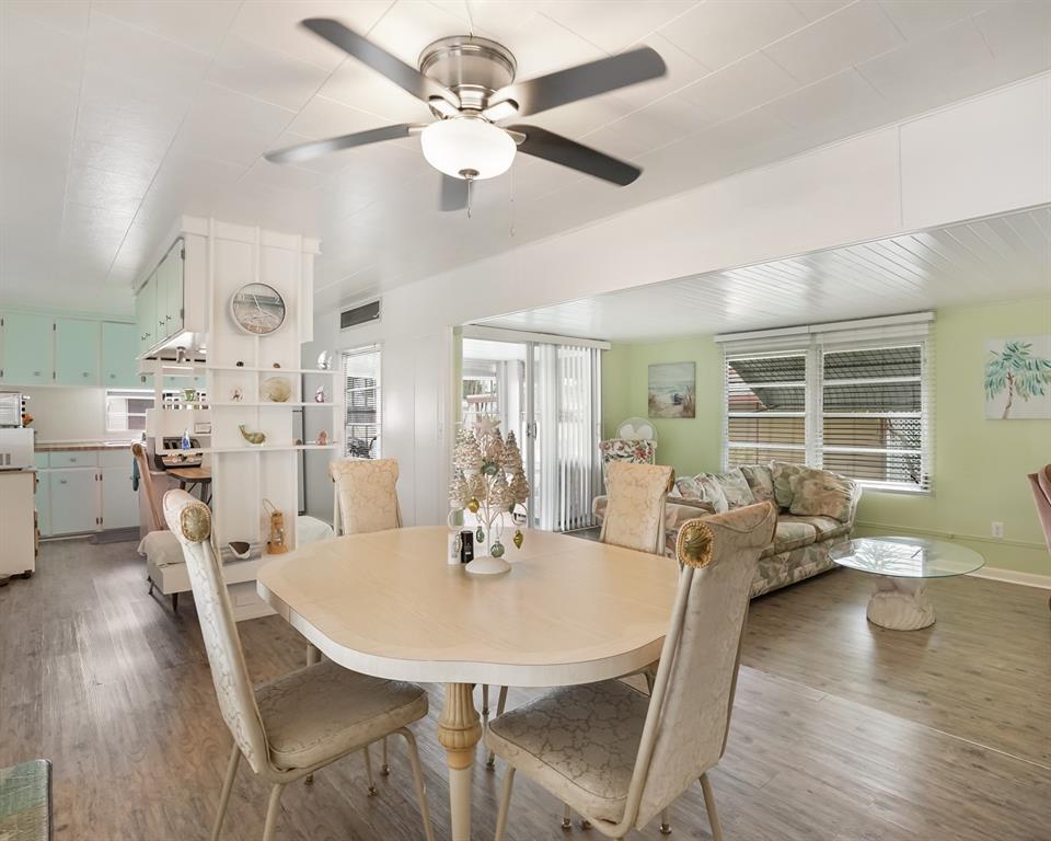Park City Davie, FL 33324 - Photo 3 of 26 a view of a dining room with furniture window and wooden floor