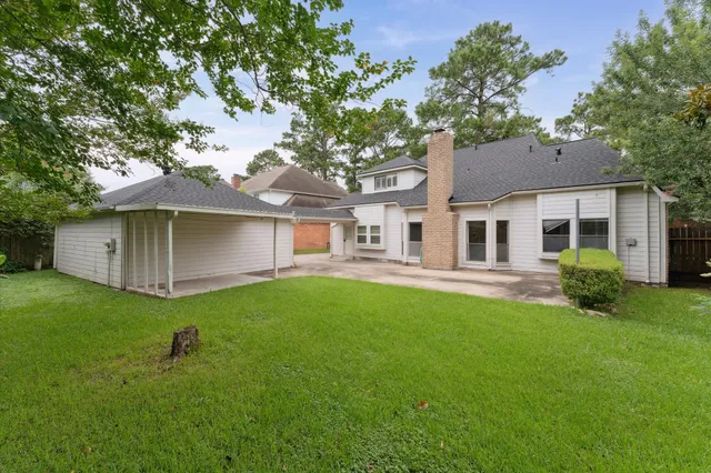 a house view with a garden space