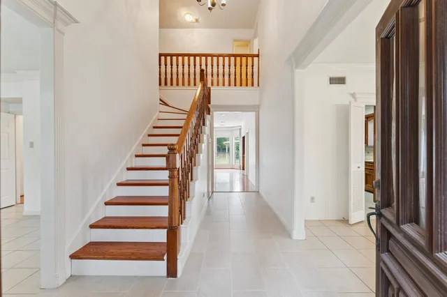 a view of entryway with stairs