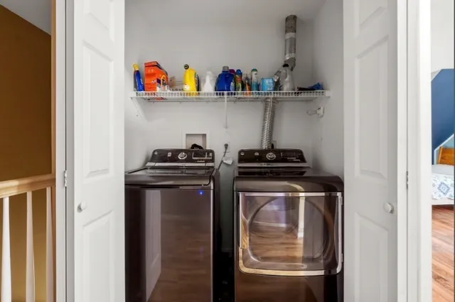 a utility room with washer and dryer