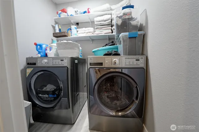 a utility room with dryer and washer