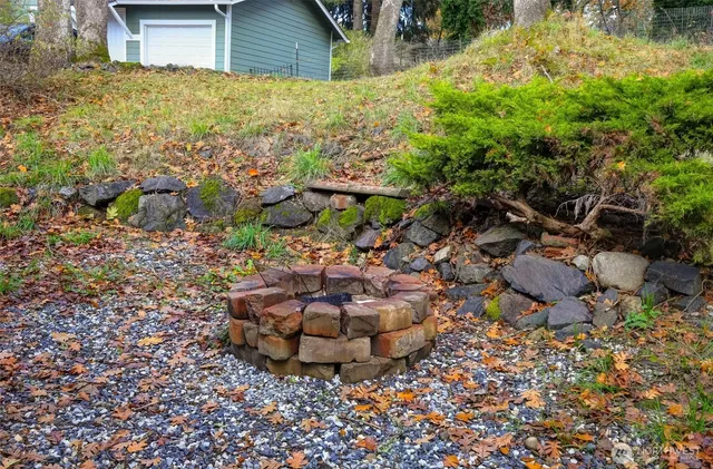 a view of a backyard of the house