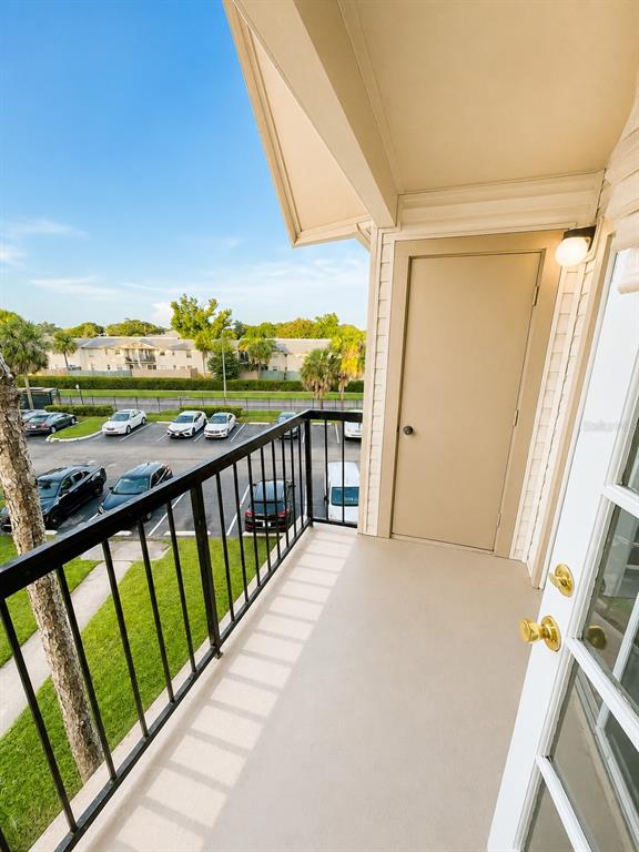 1908 Lake Atriums Circle, Unit 9 Orlando, FL 32839 - Photo 11 of 11 a view of balcony with furniture