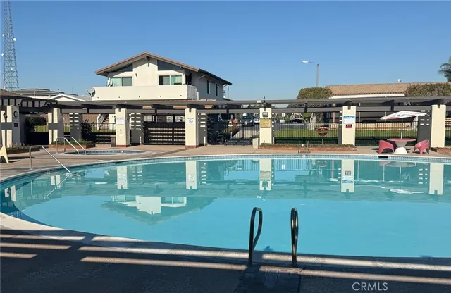 a view of a house with pool yard