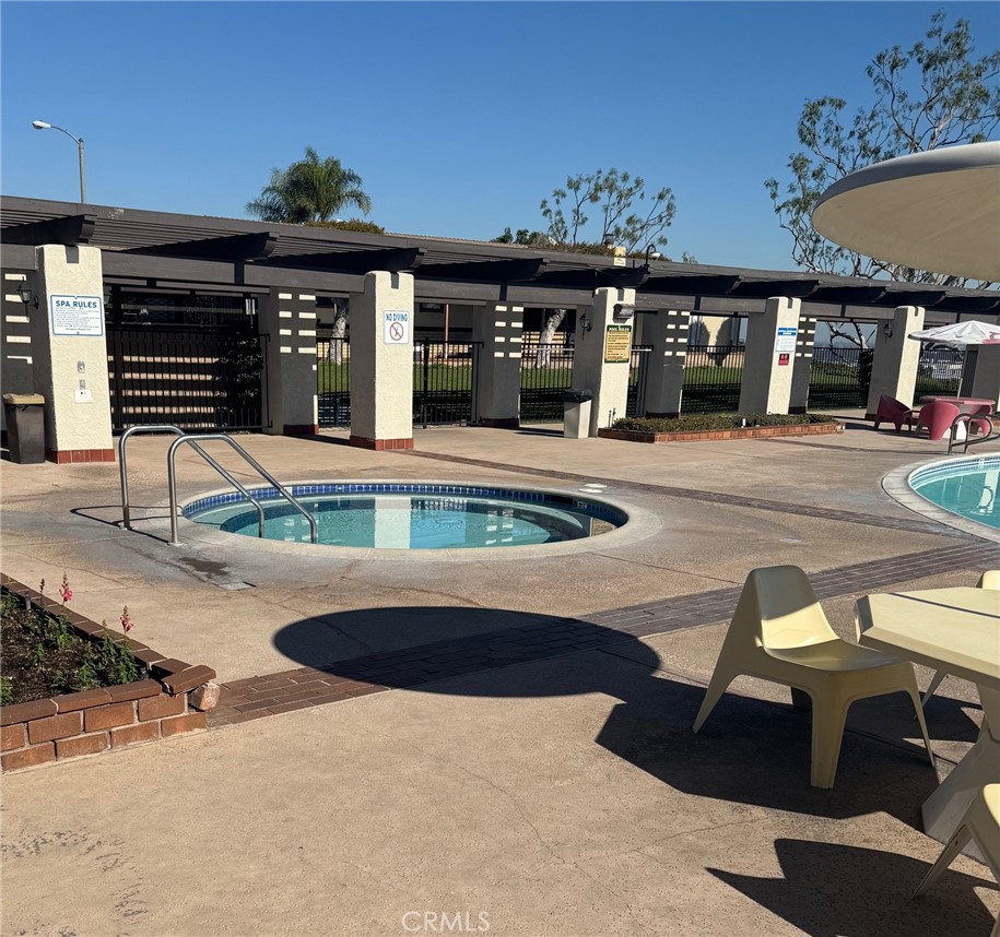 19009 South Laurel Park Road, Unit 248 Rancho Dominguez, CA 90220 - Photo 20 of 20 a front view of a building with street