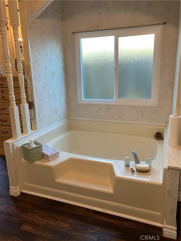 a view of a bath tub sitting in a bathroom