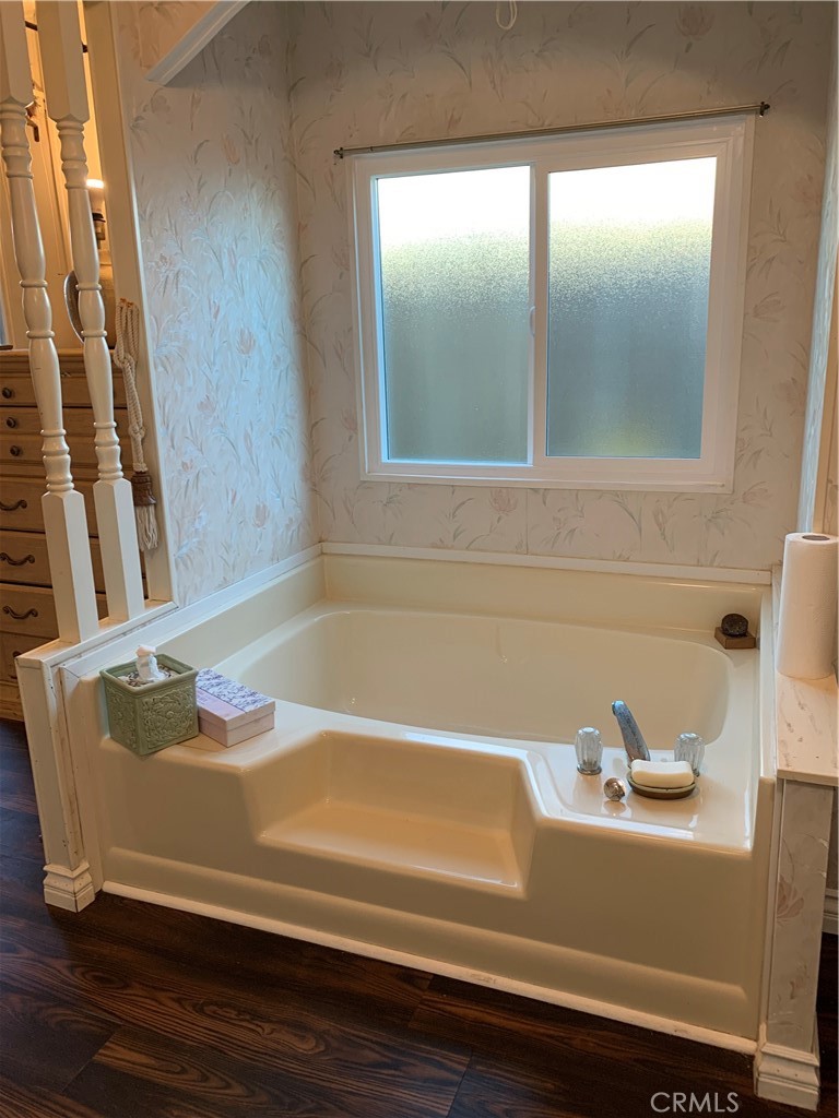 19009 South Laurel Park Road, Unit 248 Rancho Dominguez, CA 90220 - Photo 7 of 20 a view of a bath tub sitting in a bathroom