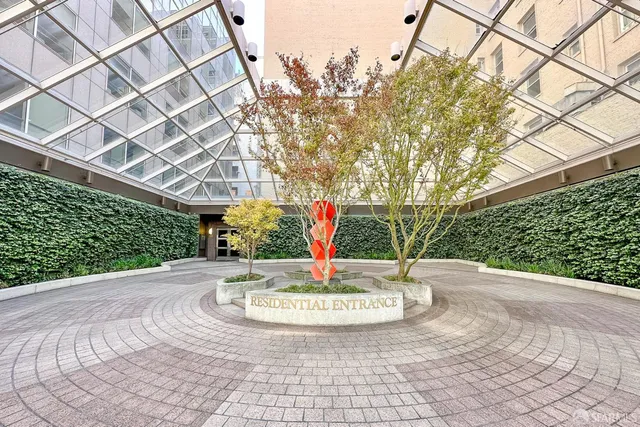 a view of fountain along with trees